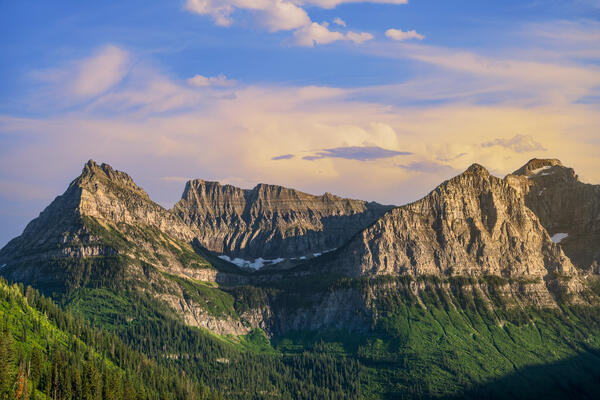 sunset colors over the montana mountains at glacier national park