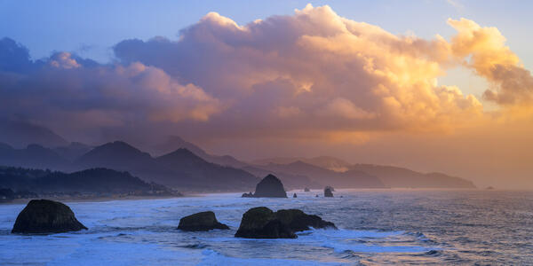 Oregon Coast landscape scene of an elevated view of Cannon Beach Oregon at sunset