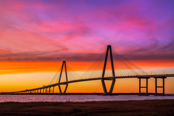 South Carolina landscape scene of Arthur Ravenel Jr bridge at sunset in Charleston