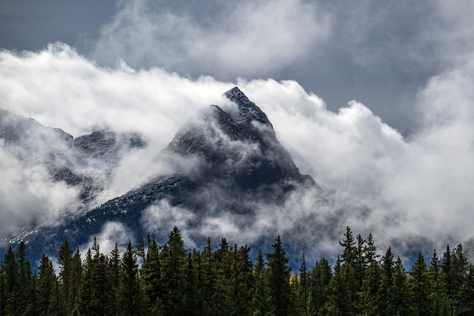 Silverton Storm landscape scene of storm cloulds swirling around a jagged mountain peak in colorado
