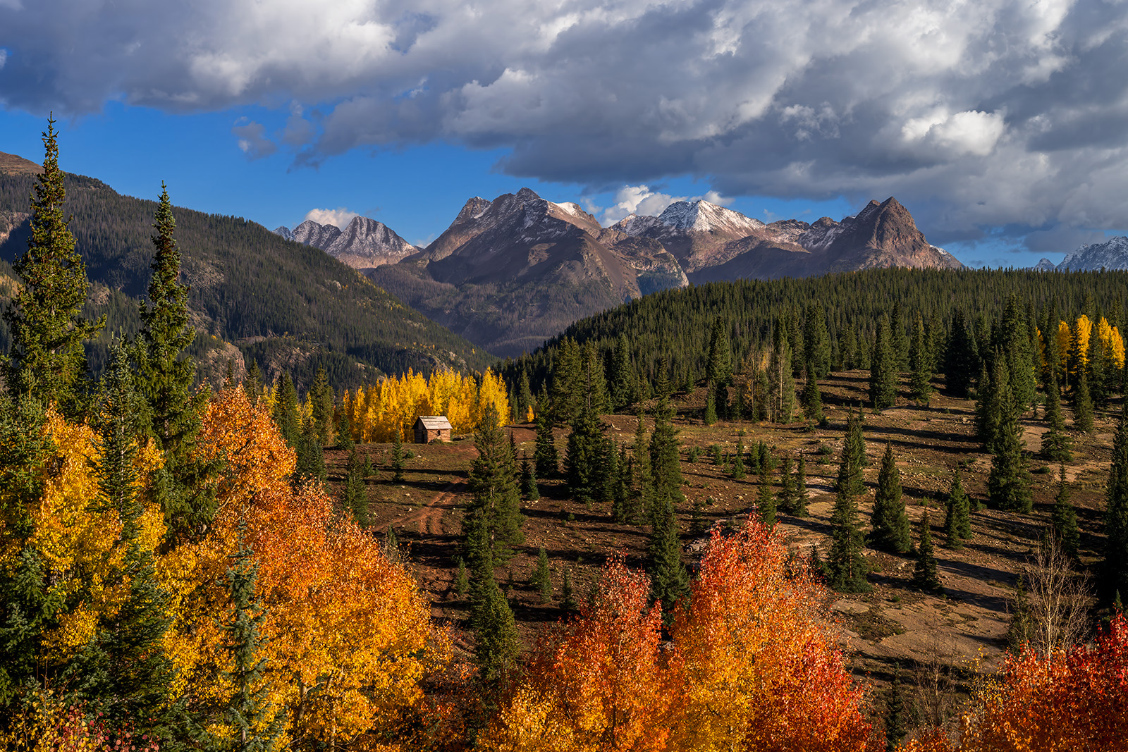 Seclusion Small secluded cabin in the colorado mountains surrounded by fall color