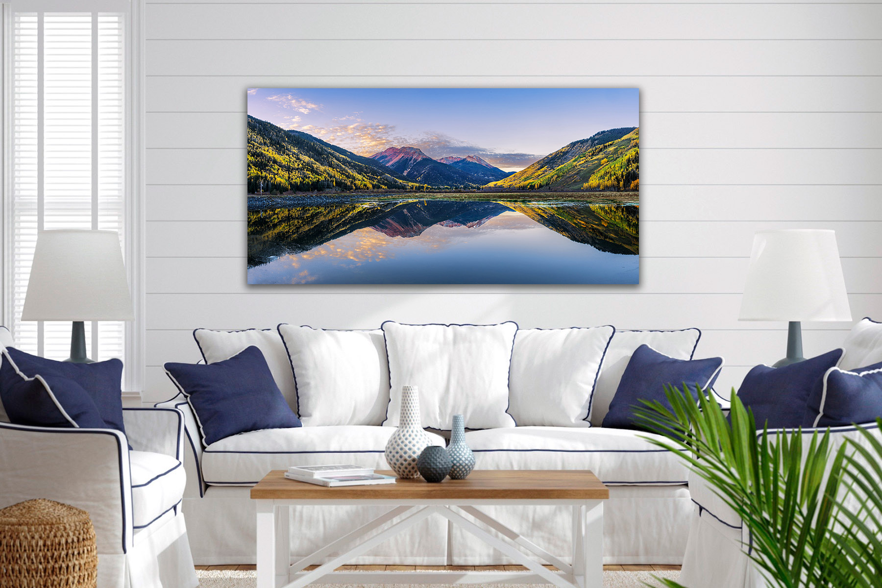 Colorado mountains and fall color reflecting in a lake as a print on a wall