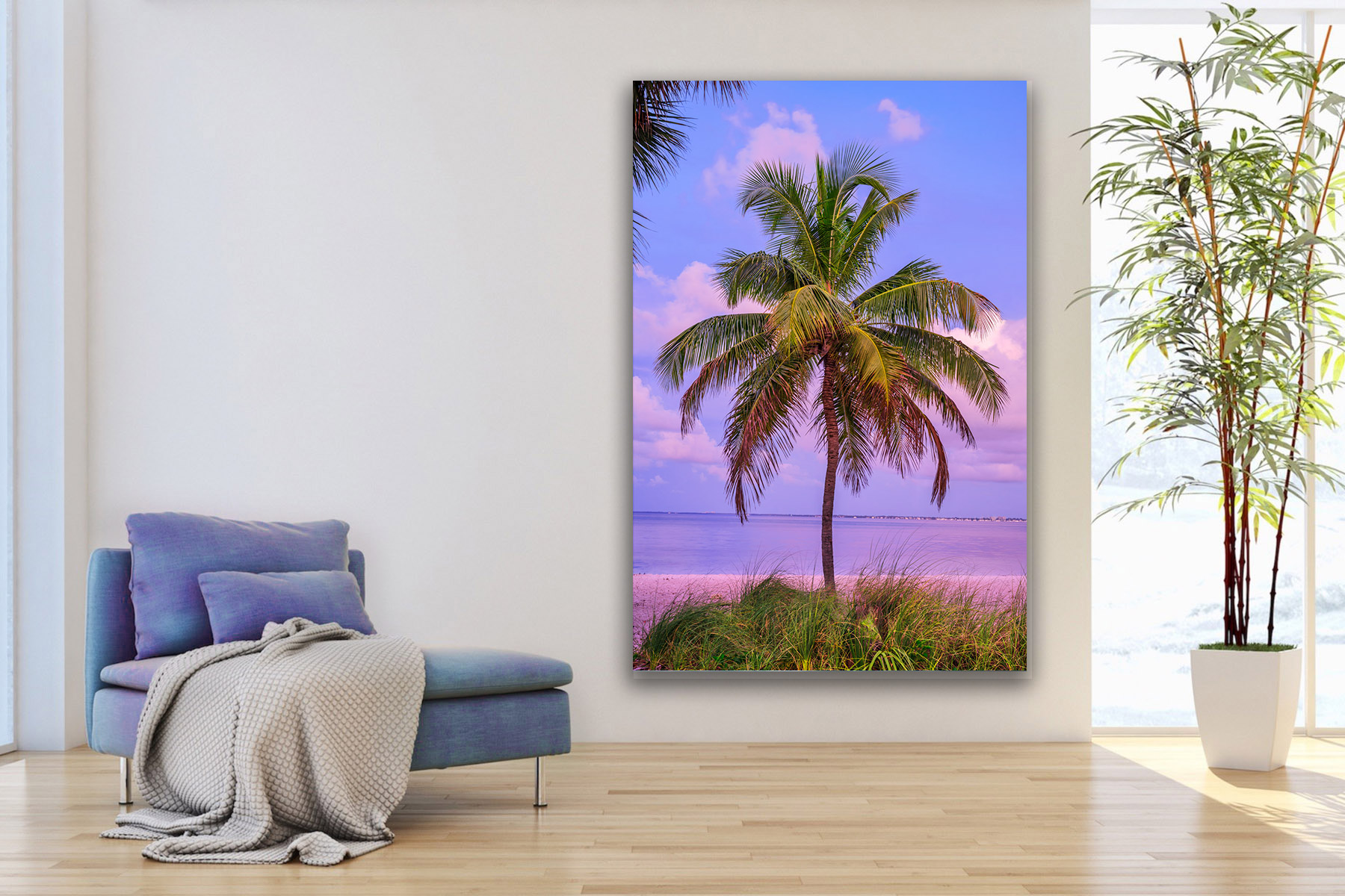 A lone palm tree on the beacv as a print on the wall