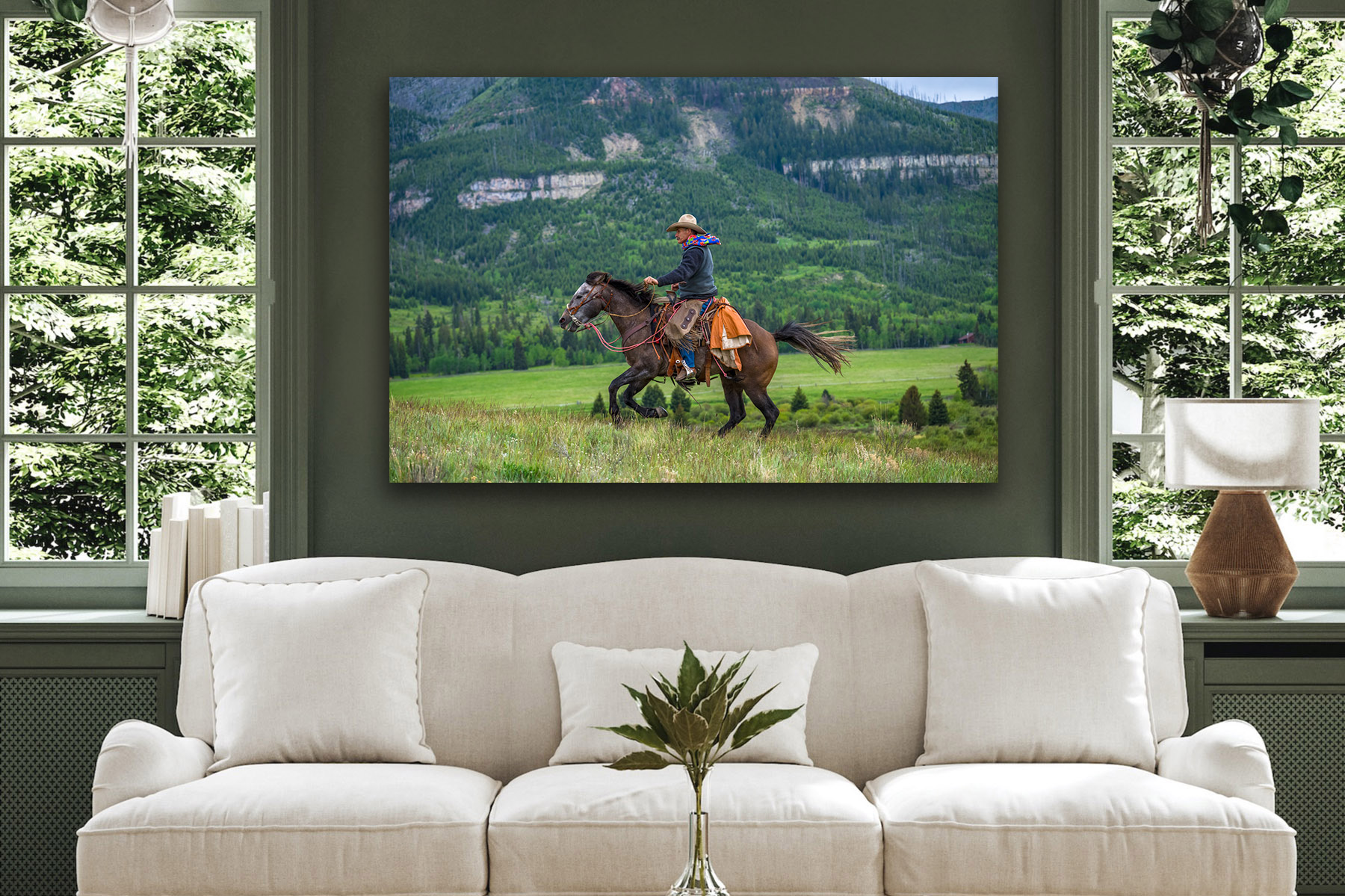 Cowboy on a horse running uphill as a fine art photo print on the wall