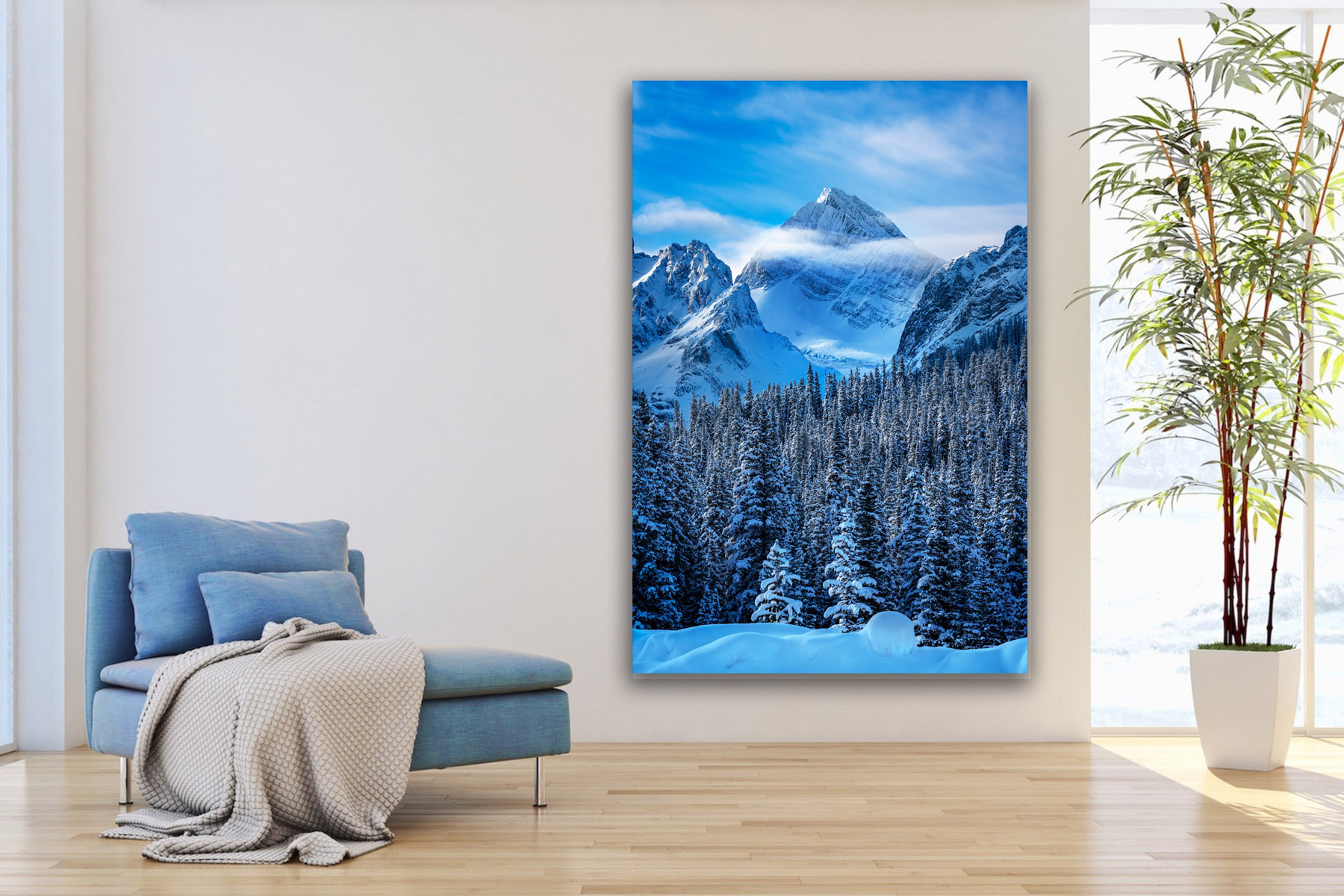 vertical view of clouds in snow covered mountains in Canada as a fine art photo print on the wall