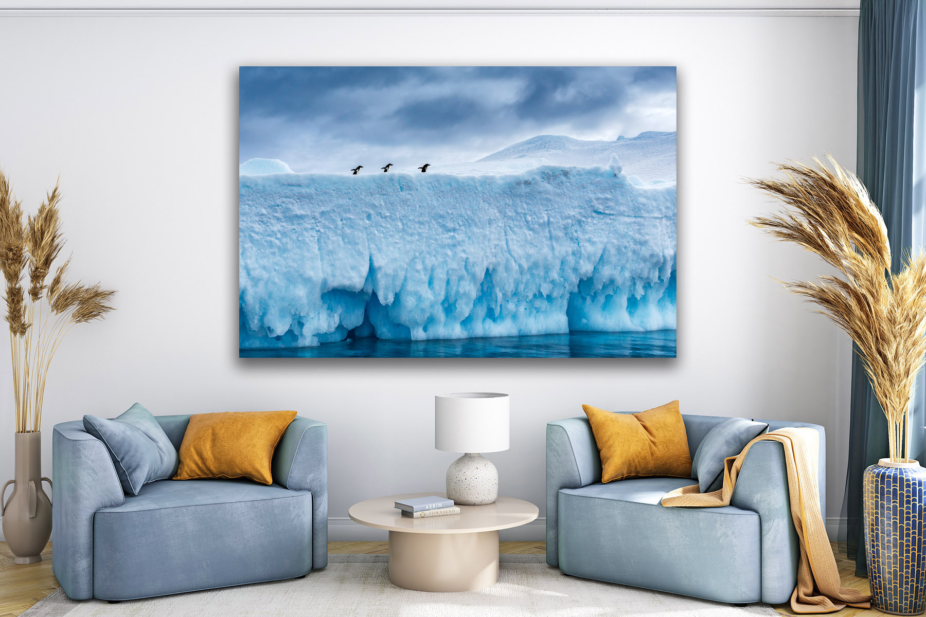 Three penguins on top of a huge Antarctica iceberg as a fine art photo print on the wall